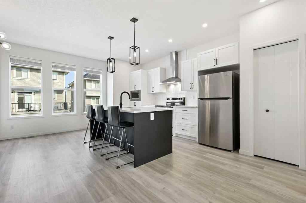 MLS® A2255419 - 415 South Point Lane SW in South Point Airdrie, Residential