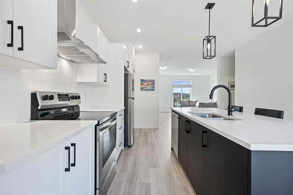 MLS® A2255419 - 415 South Point Lane SW in South Point Airdrie, Residential