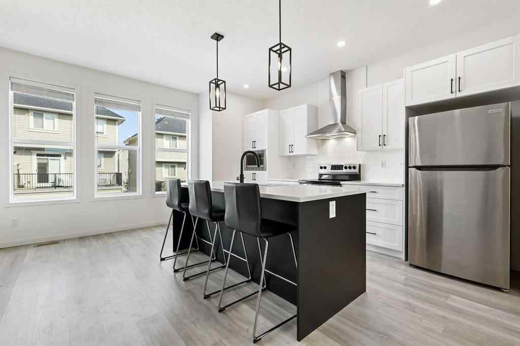 MLS® A2255419 - 415 South Point Lane SW in South Point Airdrie, Residential