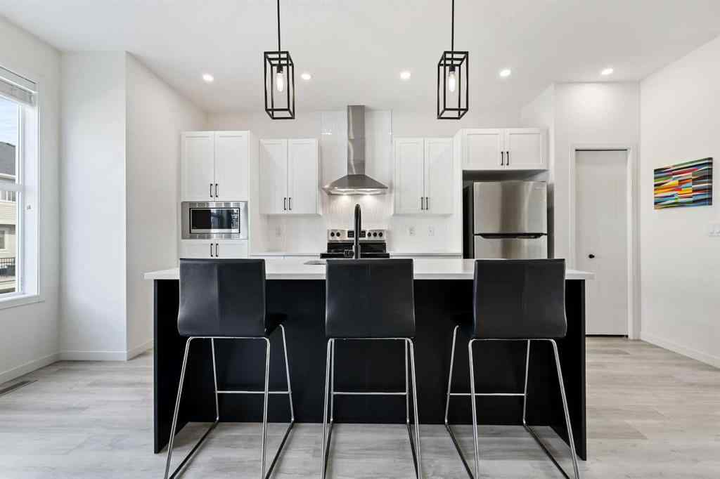 MLS® A2255419 - 415 South Point Lane SW in South Point Airdrie, Residential