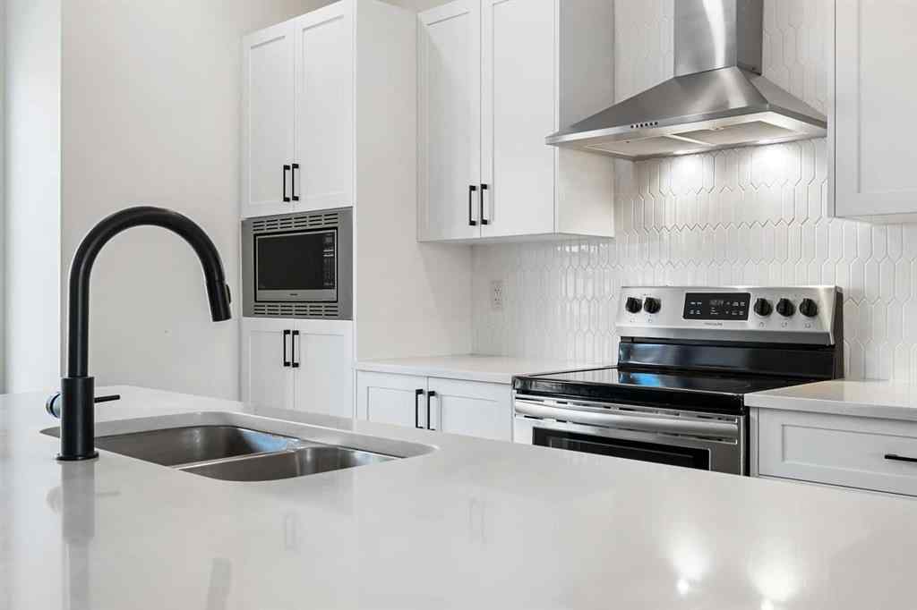 MLS® A2255419 - 415 South Point Lane SW in South Point Airdrie, Residential