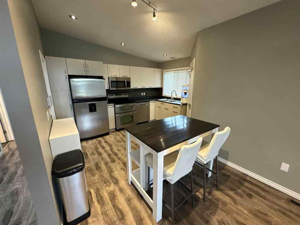 MLS® A2255431 - 10245 113 Avenue  in Avondale Grande Prairie, Residential