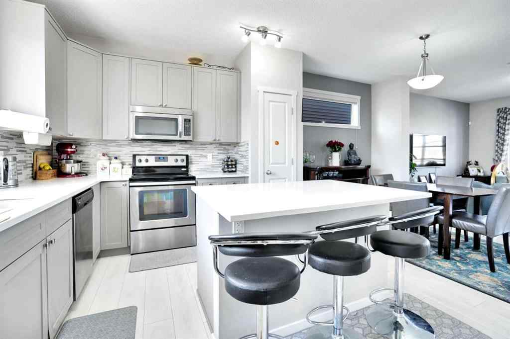 MLS® A2255435 - 215 Savanna Parade NE in Saddle Ridge Calgary, Residential