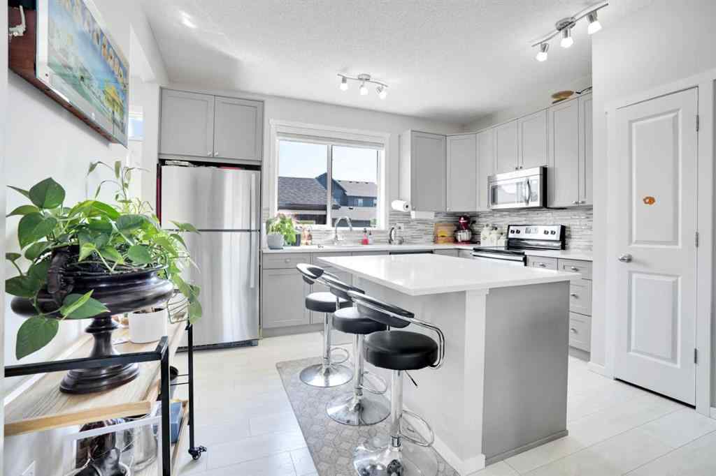 MLS® A2255435 - 215 Savanna Parade NE in Saddle Ridge Calgary, Residential