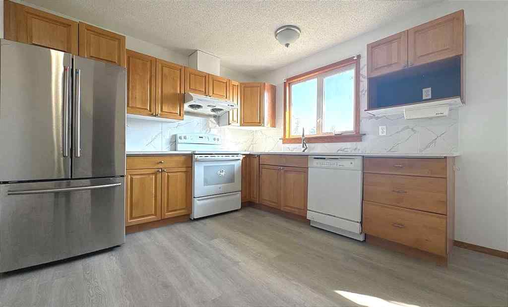 MLS® A2255440 - 932 Rundlecairn Way NE in Rundle Calgary, Residential