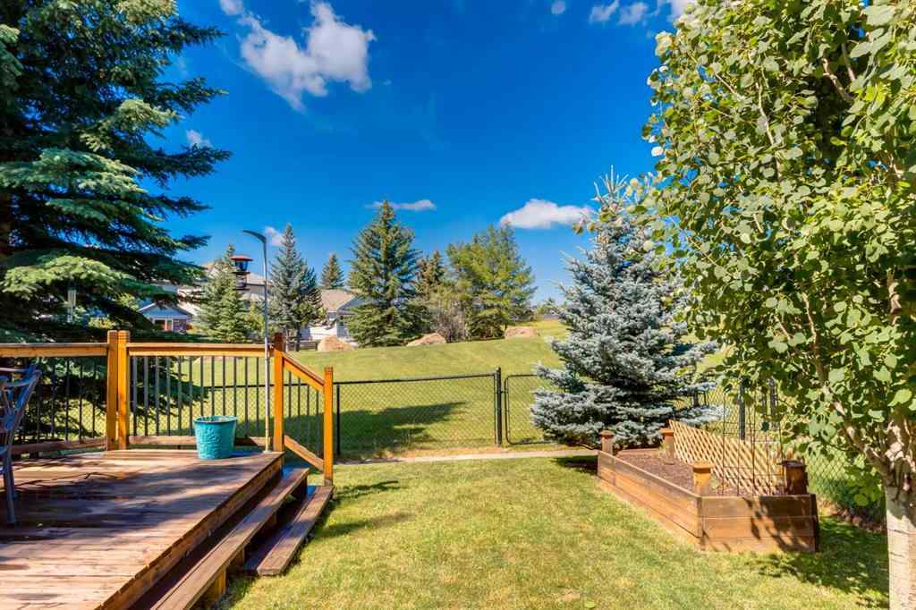 MLS® A2255446 - 21 Springbank Rise SW in Springbank Hill Calgary, Residential
