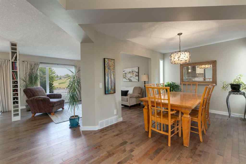 MLS® A2255446 - 21 Springbank Rise SW in Springbank Hill Calgary, Residential