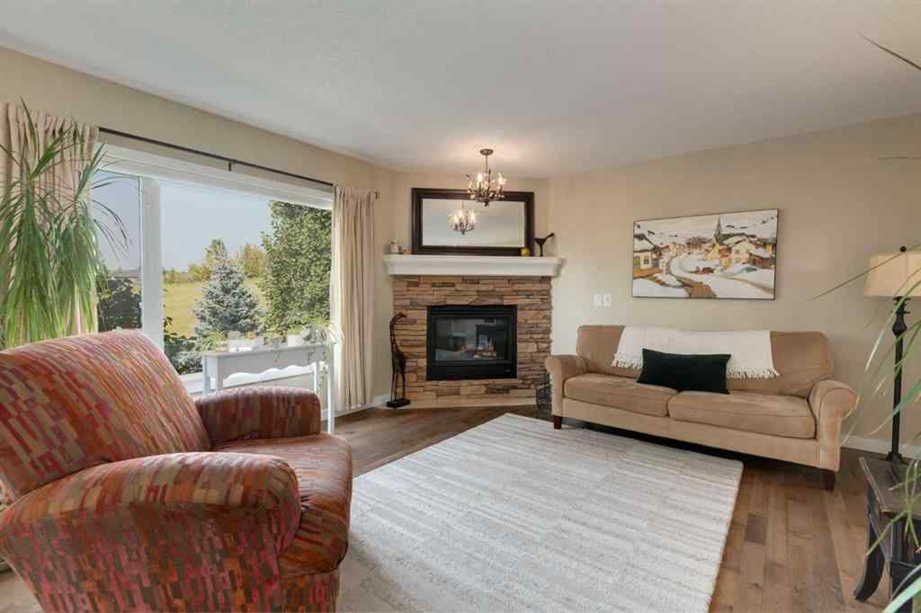 MLS® A2255446 - 21 Springbank Rise SW in Springbank Hill Calgary, Residential