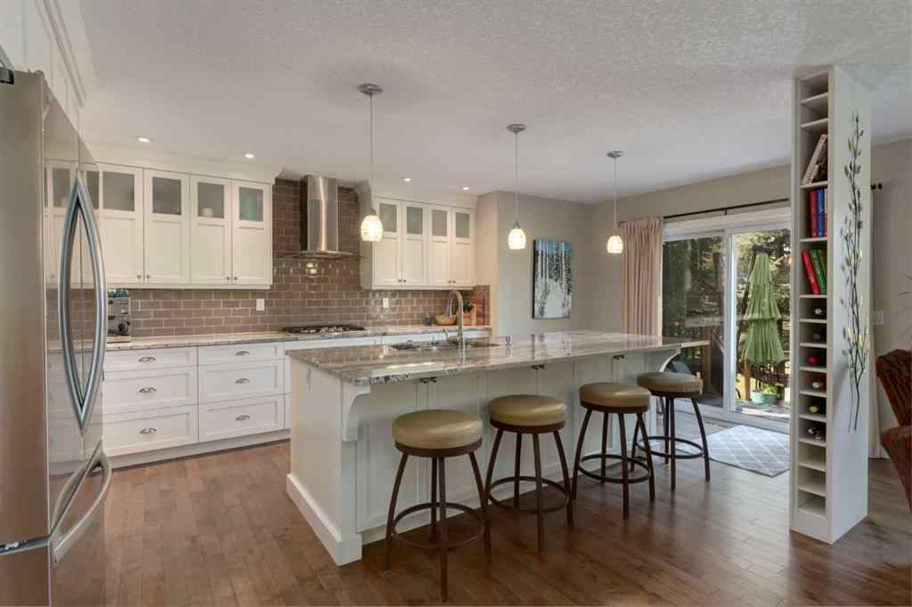 MLS® A2255446 - 21 Springbank Rise SW in Springbank Hill Calgary, Residential