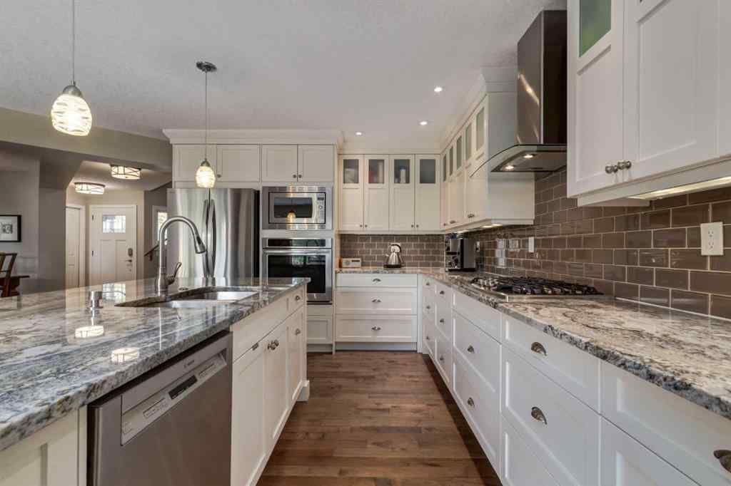 MLS® A2255446 - 21 Springbank Rise SW in Springbank Hill Calgary, Residential