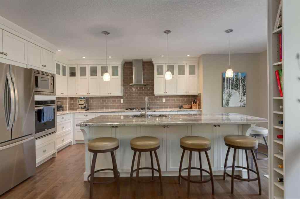 MLS® A2255446 - 21 Springbank Rise SW in Springbank Hill Calgary, Residential