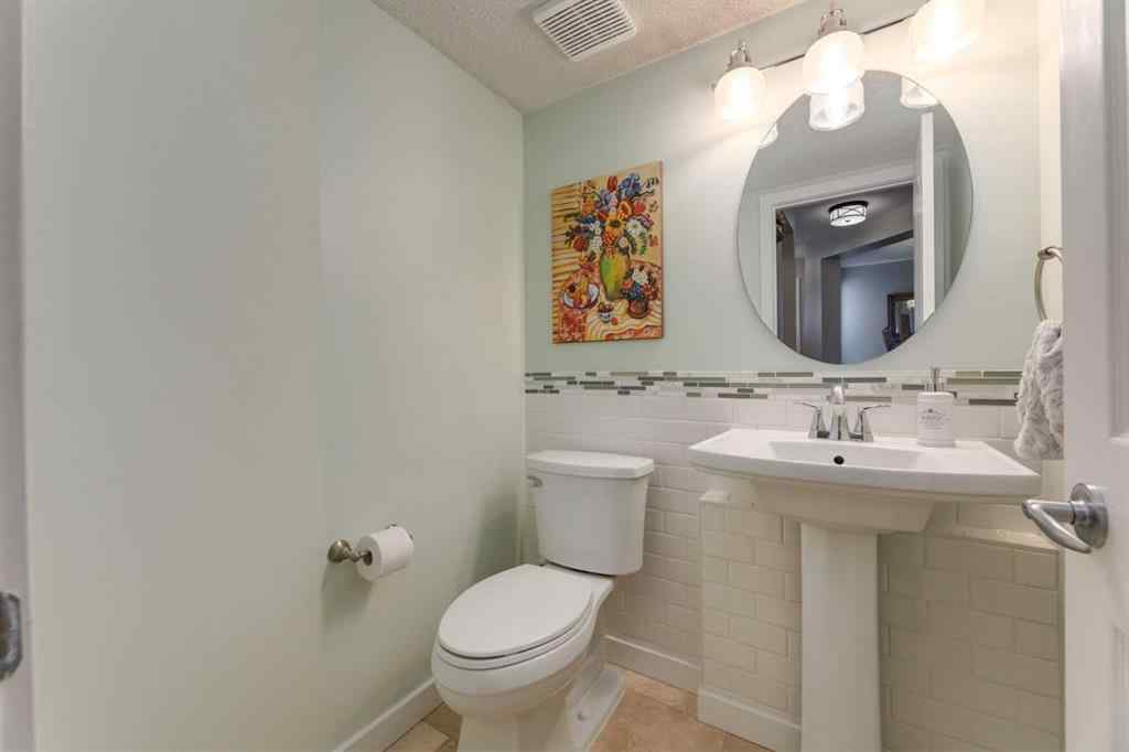 MLS® A2255446 - 21 Springbank Rise SW in Springbank Hill Calgary, Residential