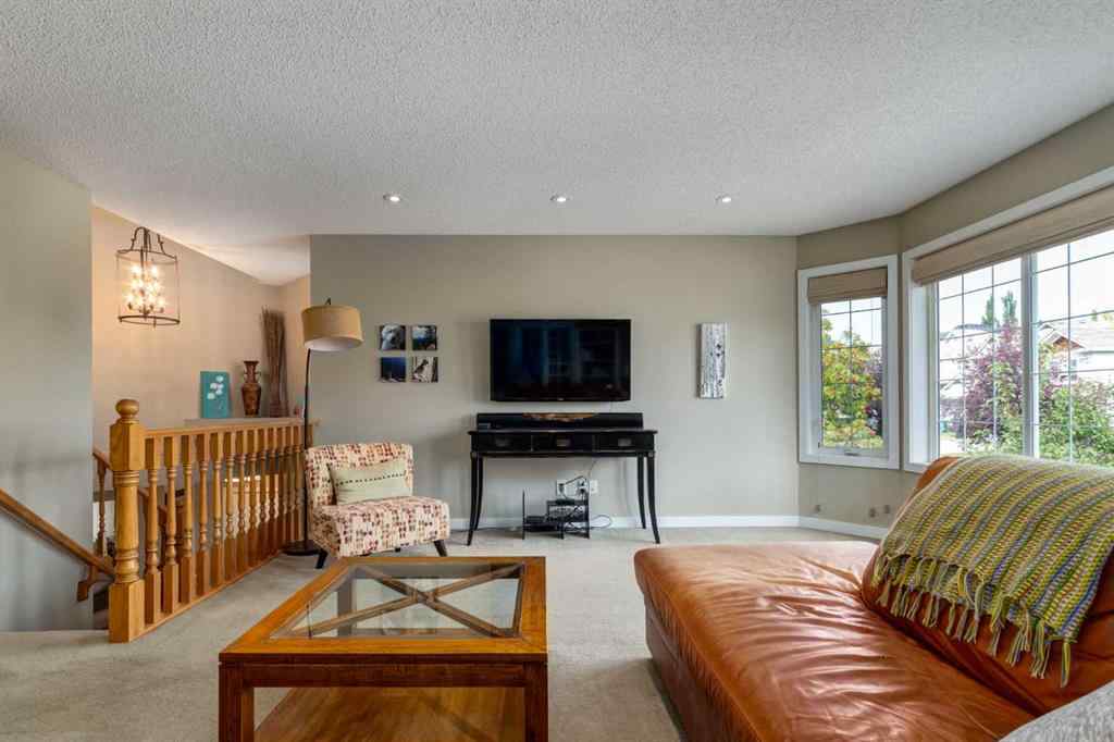 MLS® A2255446 - 21 Springbank Rise SW in Springbank Hill Calgary, Residential