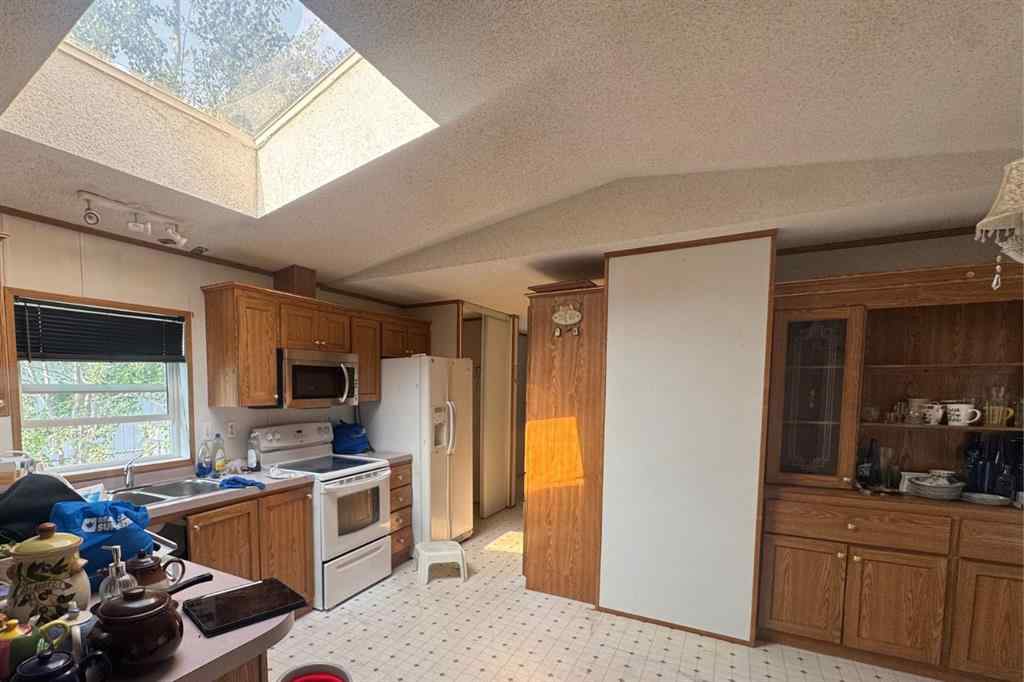 MLS® A2255452 - 9738 121 Avenue  in Crystal Ridge Grande Prairie, Residential