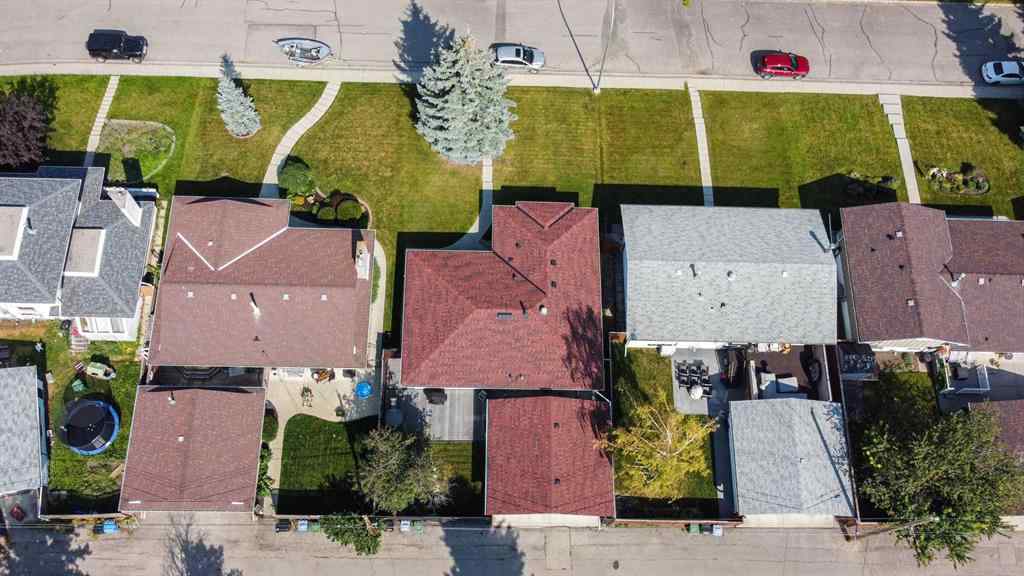 MLS® A2255453 - 64 Lake Emerald Road SE in Lake Bonavista Calgary, Residential