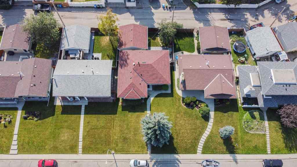 MLS® A2255453 - 64 Lake Emerald Road SE in Lake Bonavista Calgary, Residential