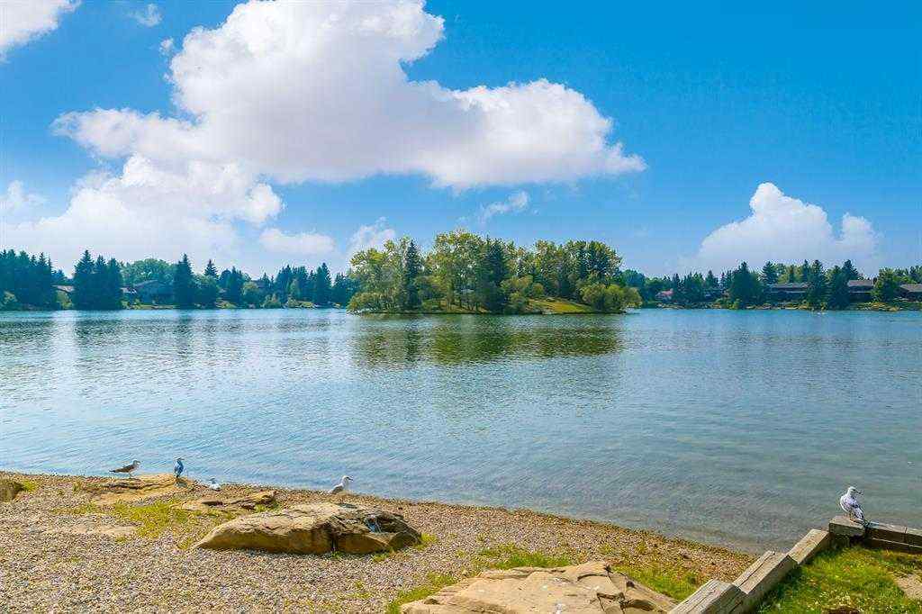 MLS® A2255453 - 64 Lake Emerald Road SE in Lake Bonavista Calgary, Residential