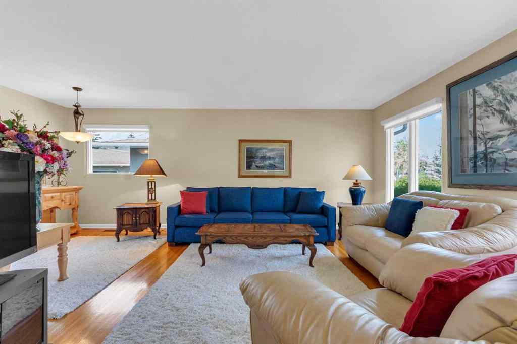 MLS® A2255453 - 64 Lake Emerald Road SE in Lake Bonavista Calgary, Residential