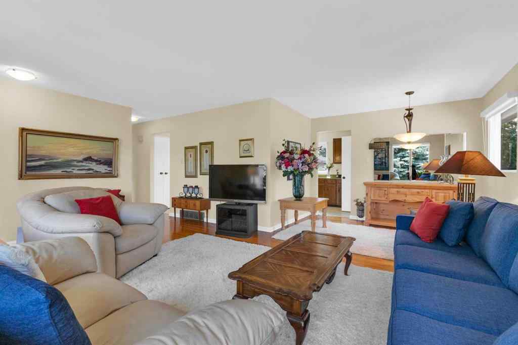 MLS® A2255453 - 64 Lake Emerald Road SE in Lake Bonavista Calgary, Residential