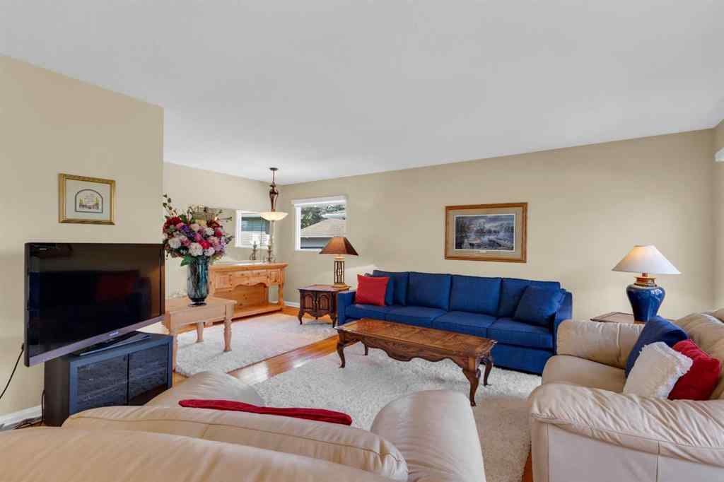 MLS® A2255453 - 64 Lake Emerald Road SE in Lake Bonavista Calgary, Residential