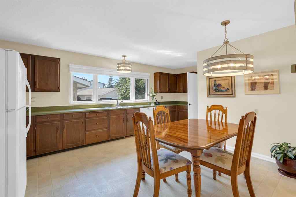 MLS® A2255453 - 64 Lake Emerald Road SE in Lake Bonavista Calgary, Residential