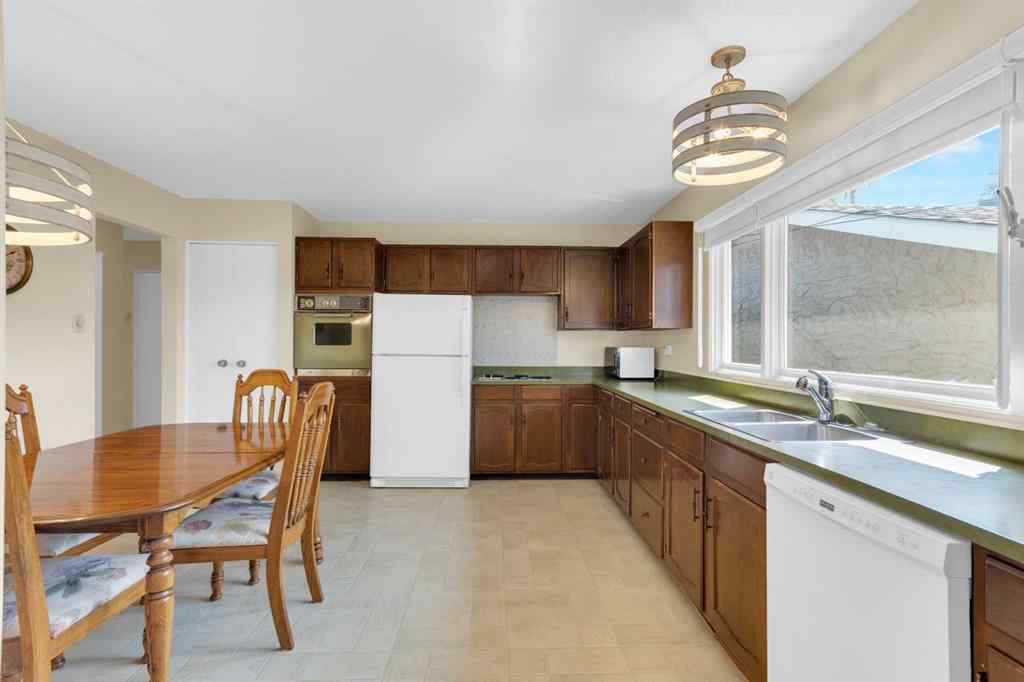 MLS® A2255453 - 64 Lake Emerald Road SE in Lake Bonavista Calgary, Residential