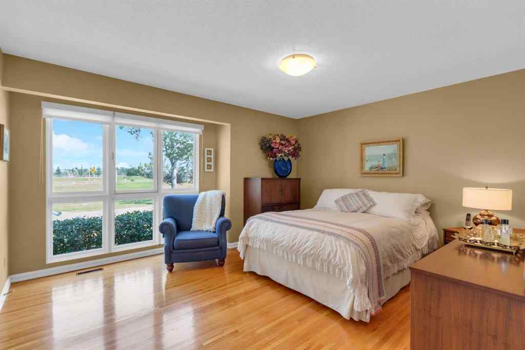 MLS® A2255453 - 64 Lake Emerald Road SE in Lake Bonavista Calgary, Residential