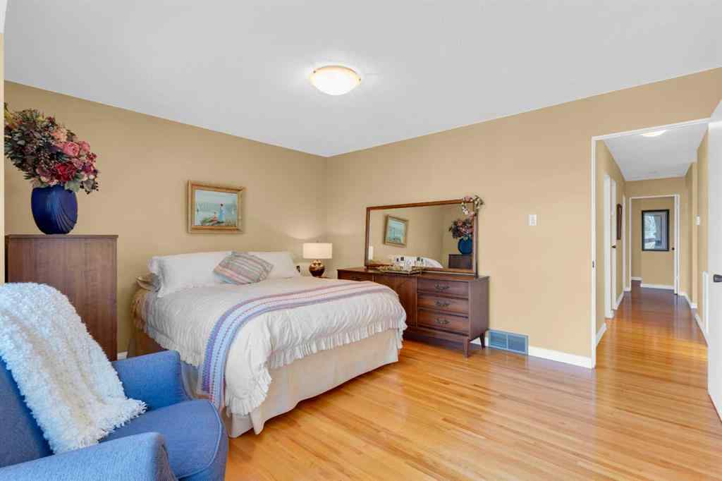 MLS® A2255453 - 64 Lake Emerald Road SE in Lake Bonavista Calgary, Residential