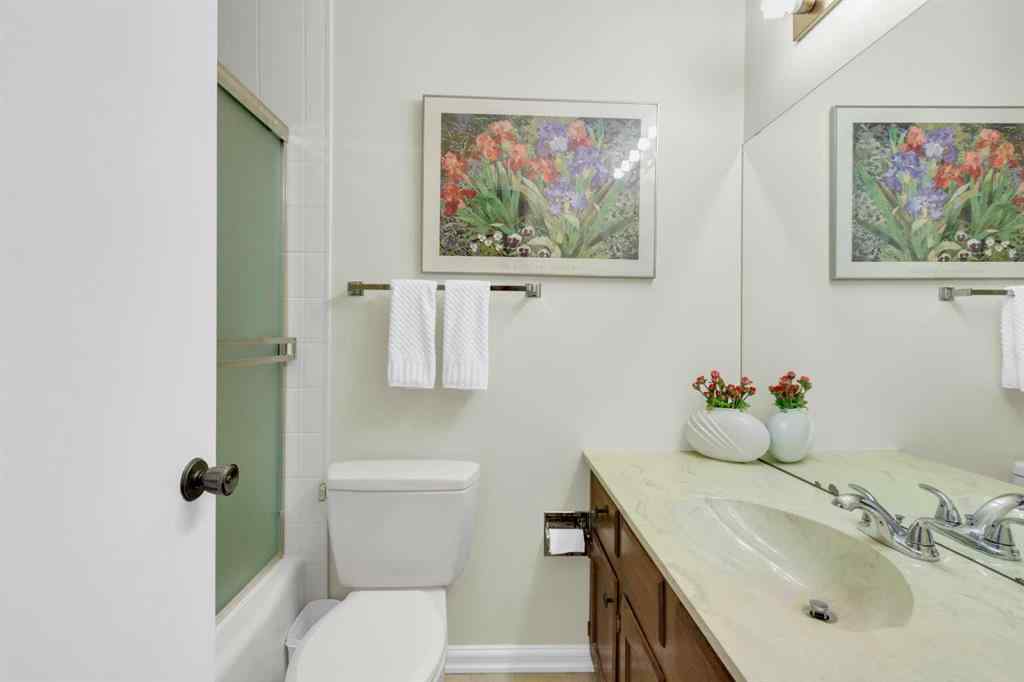 MLS® A2255453 - 64 Lake Emerald Road SE in Lake Bonavista Calgary, Residential