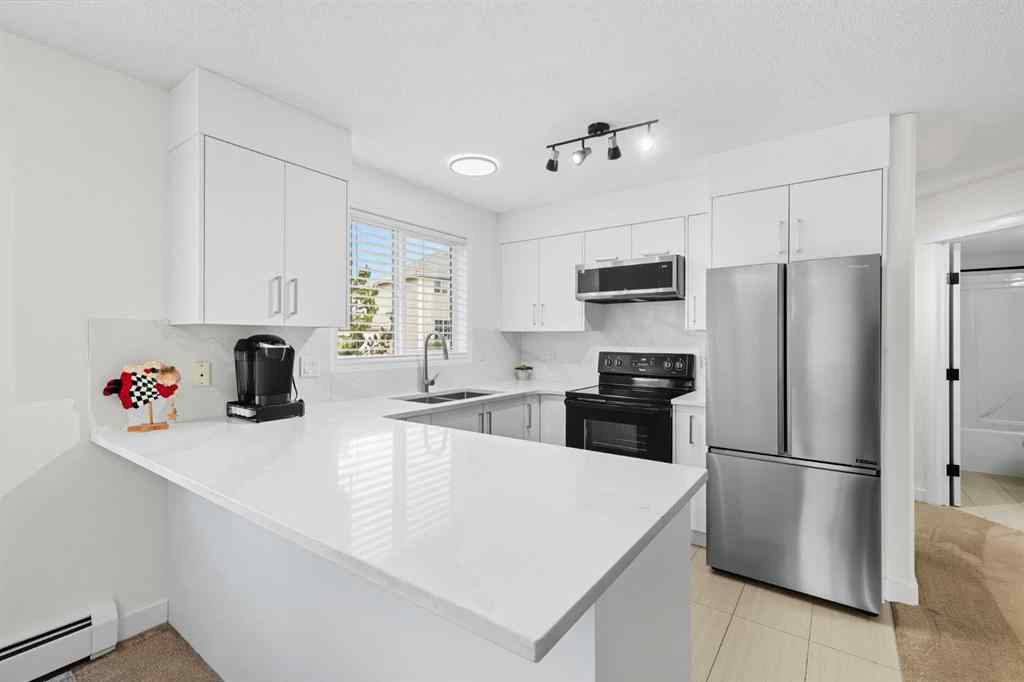 MLS® A2255454 - Unit #1211 7451 Springbank Boulevard SW in Springbank Hill Calgary, Residential