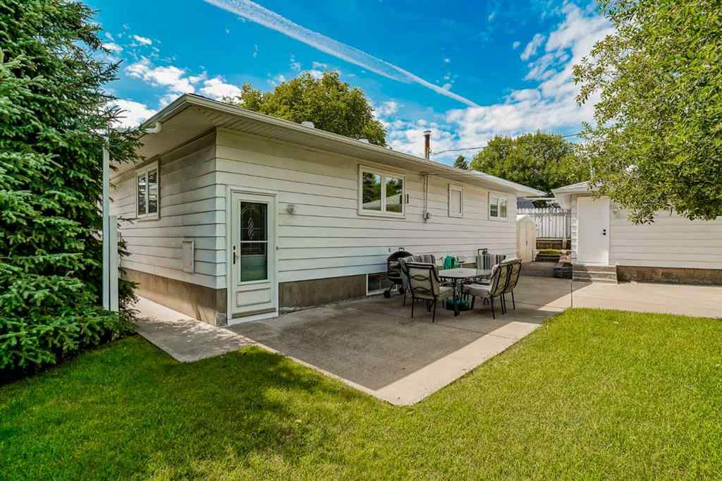 MLS® A2255459 - 7419 Huntertown Crescent NW in Huntington Hills Calgary, Residential