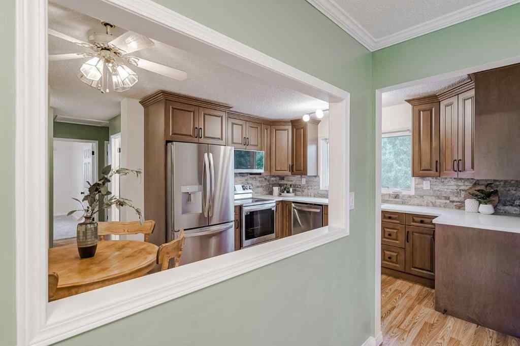 MLS® A2255459 - 7419 Huntertown Crescent NW in Huntington Hills Calgary, Residential