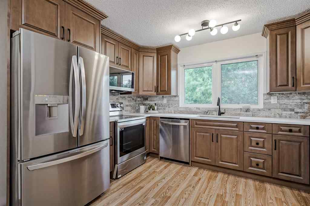 MLS® A2255459 - 7419 Huntertown Crescent NW in Huntington Hills Calgary, Residential