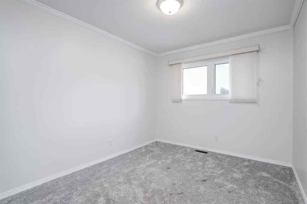 MLS® A2255459 - 7419 Huntertown Crescent NW in Huntington Hills Calgary, Residential