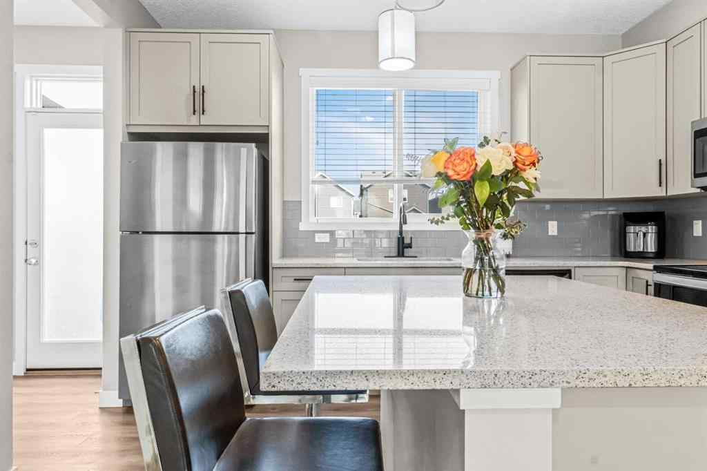 MLS® A2255467 - 360 Belmont Avenue SW in Belmont Calgary, Residential