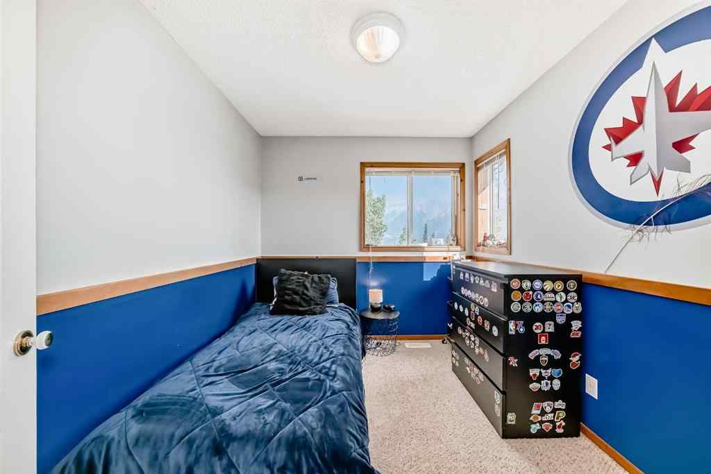 MLS® A2255475 - 985 Wilson Way  in Peaks of Grassi Canmore, Residential