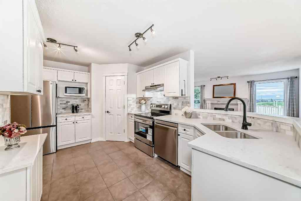 MLS® A2255479 - 71 Hidden Ranch Close NW in Hidden Valley Calgary, Residential