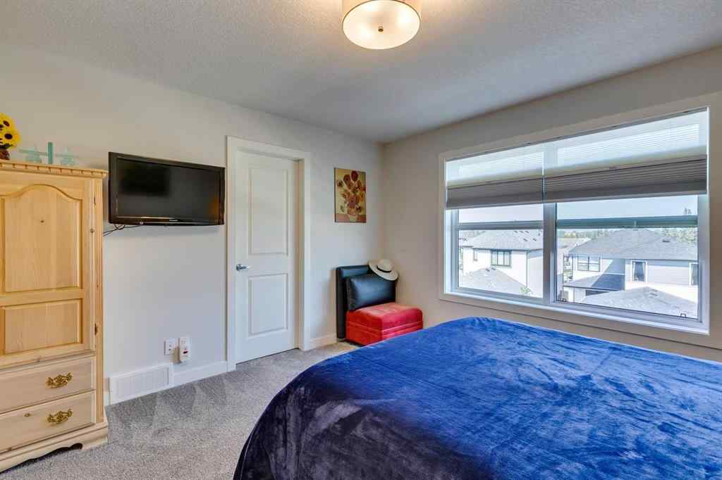 MLS® A2255503 - 819 Shawnee Terrace SW in Shawnee Slopes Calgary, Residential