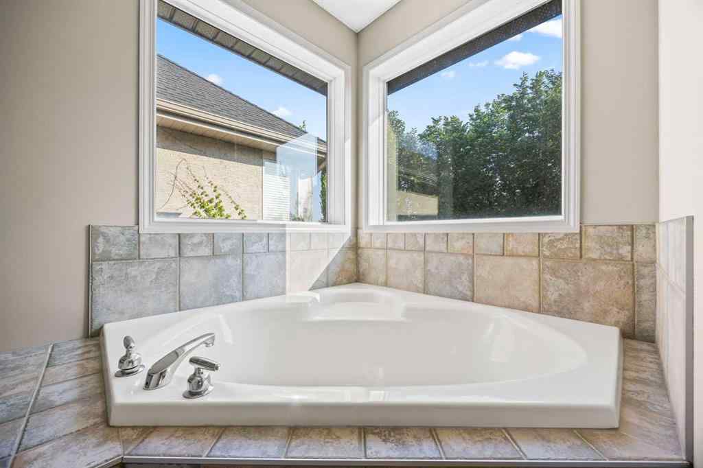 MLS® A2255508 - 974 Tuscany Drive NW in Tuscany Calgary, Residential