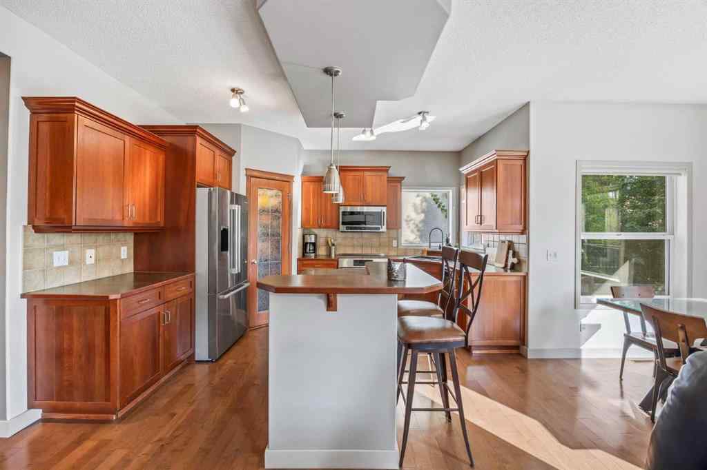 MLS® A2255508 - 974 Tuscany Drive NW in Tuscany Calgary, Residential