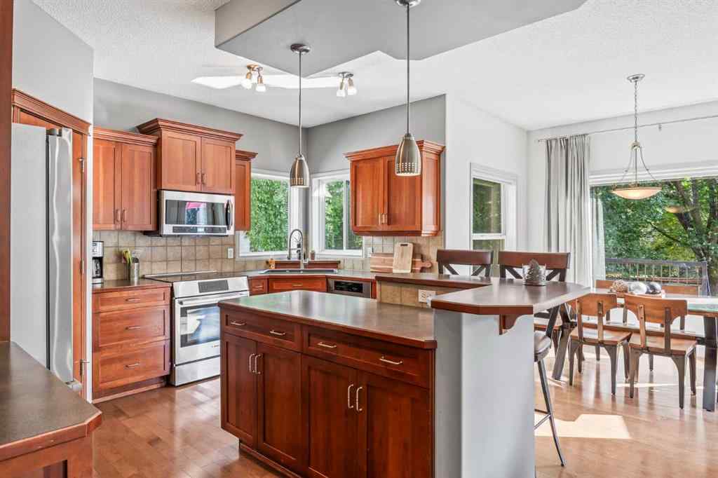 MLS® A2255508 - 974 Tuscany Drive NW in Tuscany Calgary, Residential
