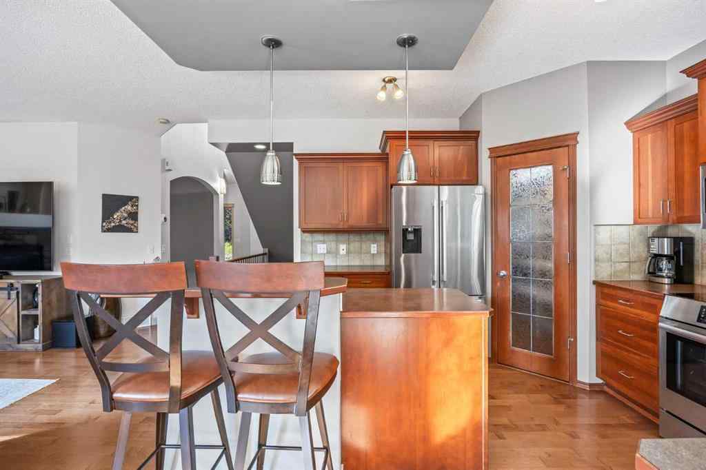 MLS® A2255508 - 974 Tuscany Drive NW in Tuscany Calgary, Residential