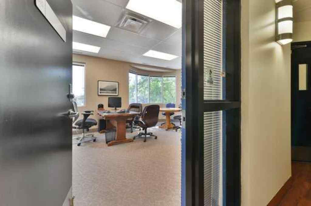 MLS® A2255520 - Unit #202 5917 1a Street SW in Highfield Calgary, Commercial