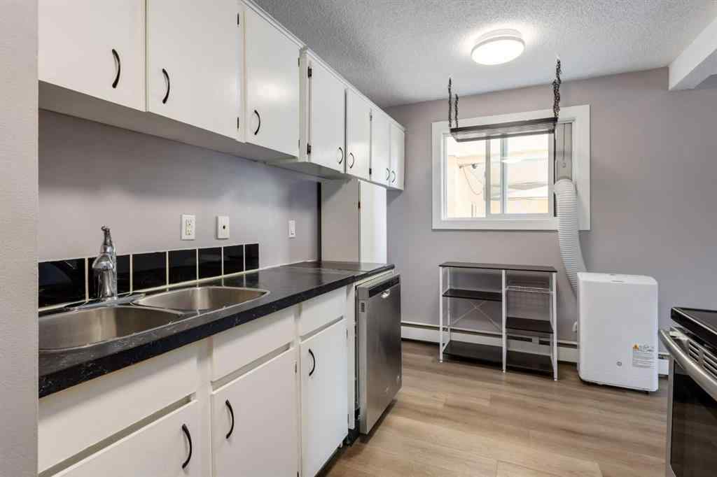 MLS® A2255542 - Unit #202 1817 11 Avenue SW in Sunalta Calgary, Residential