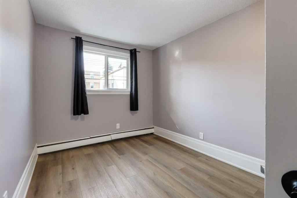 MLS® A2255542 - Unit #202 1817 11 Avenue SW in Sunalta Calgary, Residential