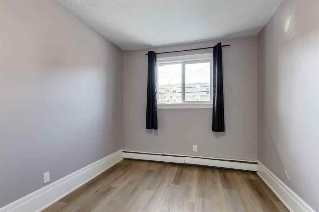 MLS® A2255542 - Unit #202 1817 11 Avenue SW in Sunalta Calgary, Residential