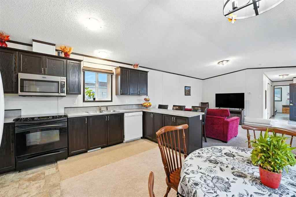 MLS® A2255552 - 113 Heritage Drive  in Heritage Okotoks Okotoks, Mobile
