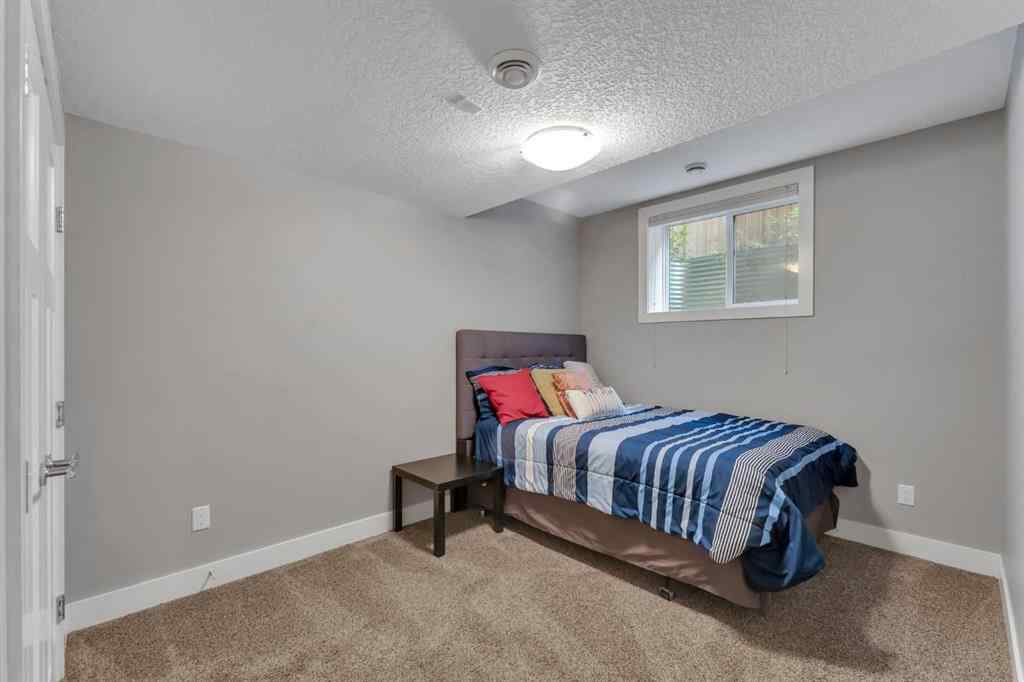 MLS® A2255562 - 220 21 Avenue NW in Tuxedo Park Calgary, Residential