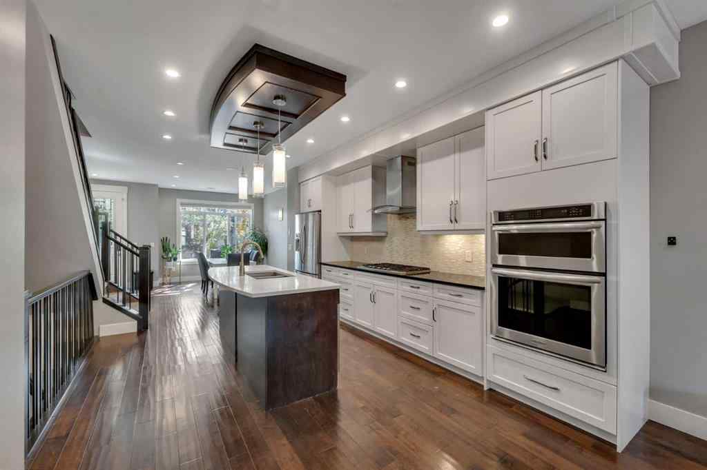 MLS® A2255562 - 220 21 Avenue NW in Tuxedo Park Calgary, Residential