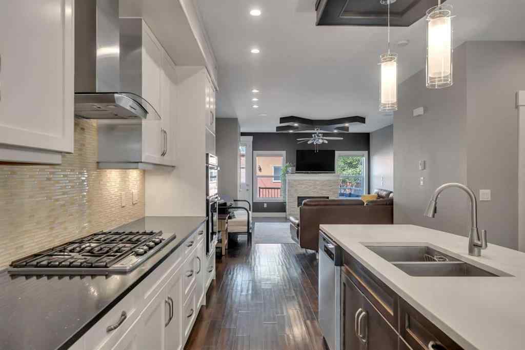 MLS® A2255562 - 220 21 Avenue NW in Tuxedo Park Calgary, Residential